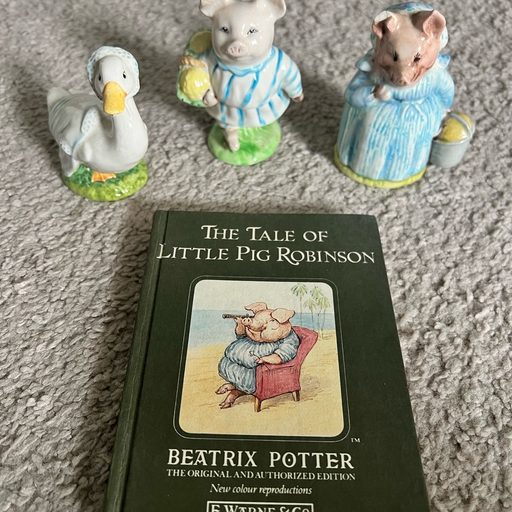 Beatrix Potter figurines and book